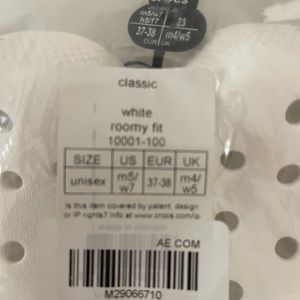 CROCS White Classic brand new still in package. Size 7 women. Size 5 Men.